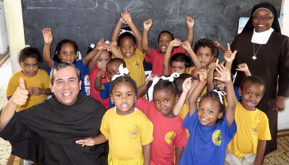 Fr. Rami with school children