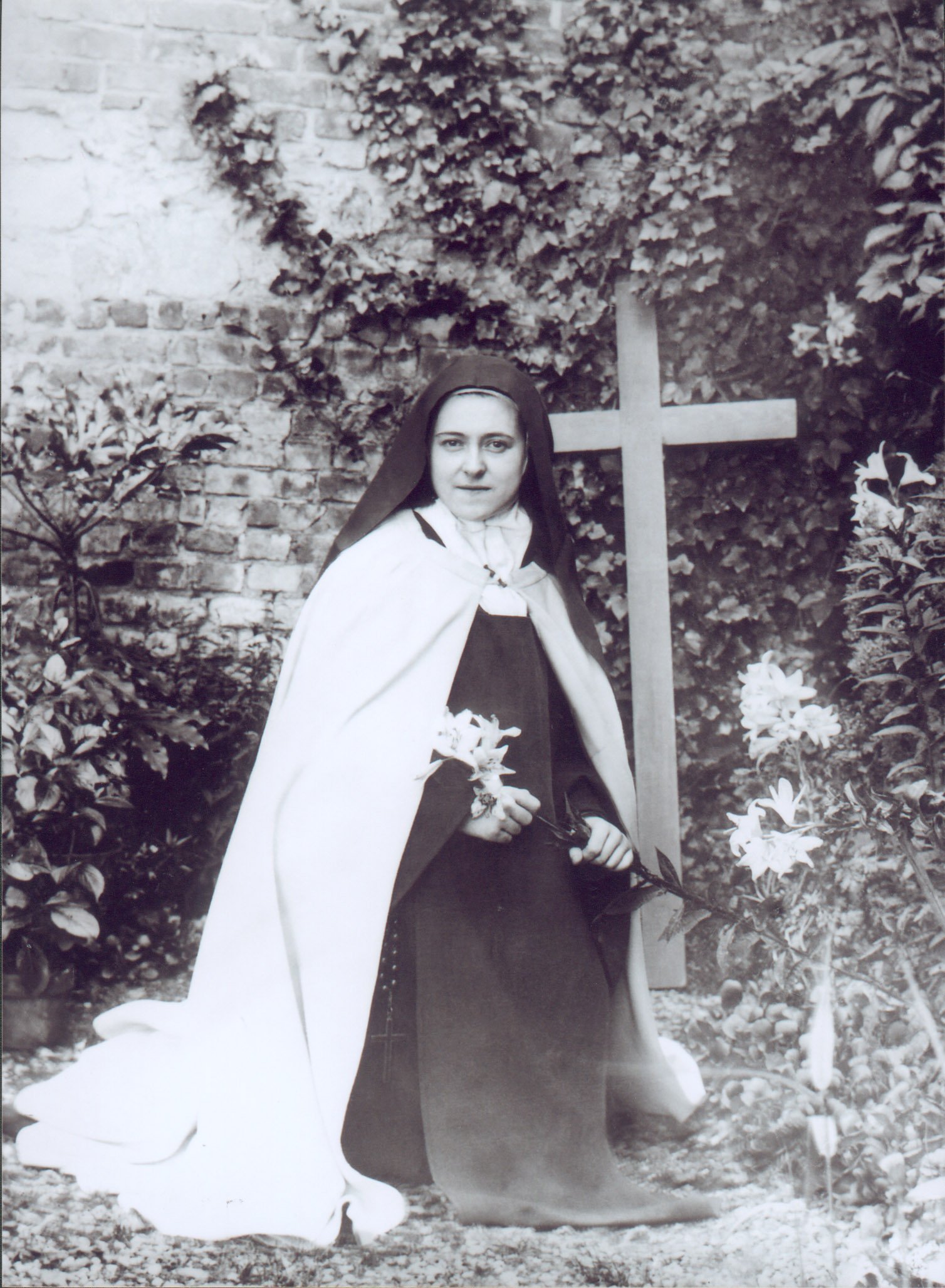St. Therese with cross and Easter Lily