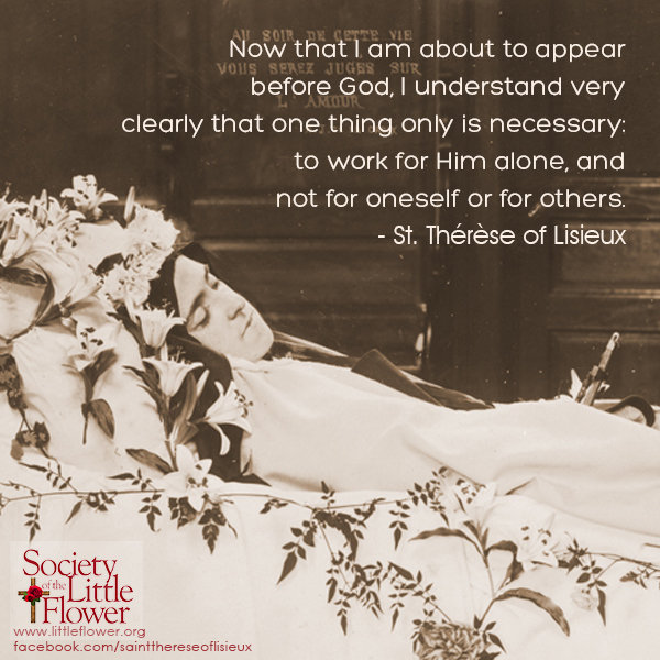 Photo detail of St. Therese, taken after her death, surrounded by flowers.