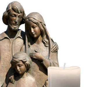 Bronze statue of The Holy Family with a candle